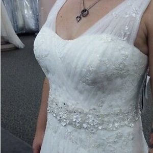 Oleg Cassini wedding gown . Ivory CWG530 Davids Bridal A-line